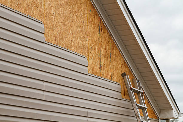 Professional Vinyl Siding technician working in Fayetteville, GA